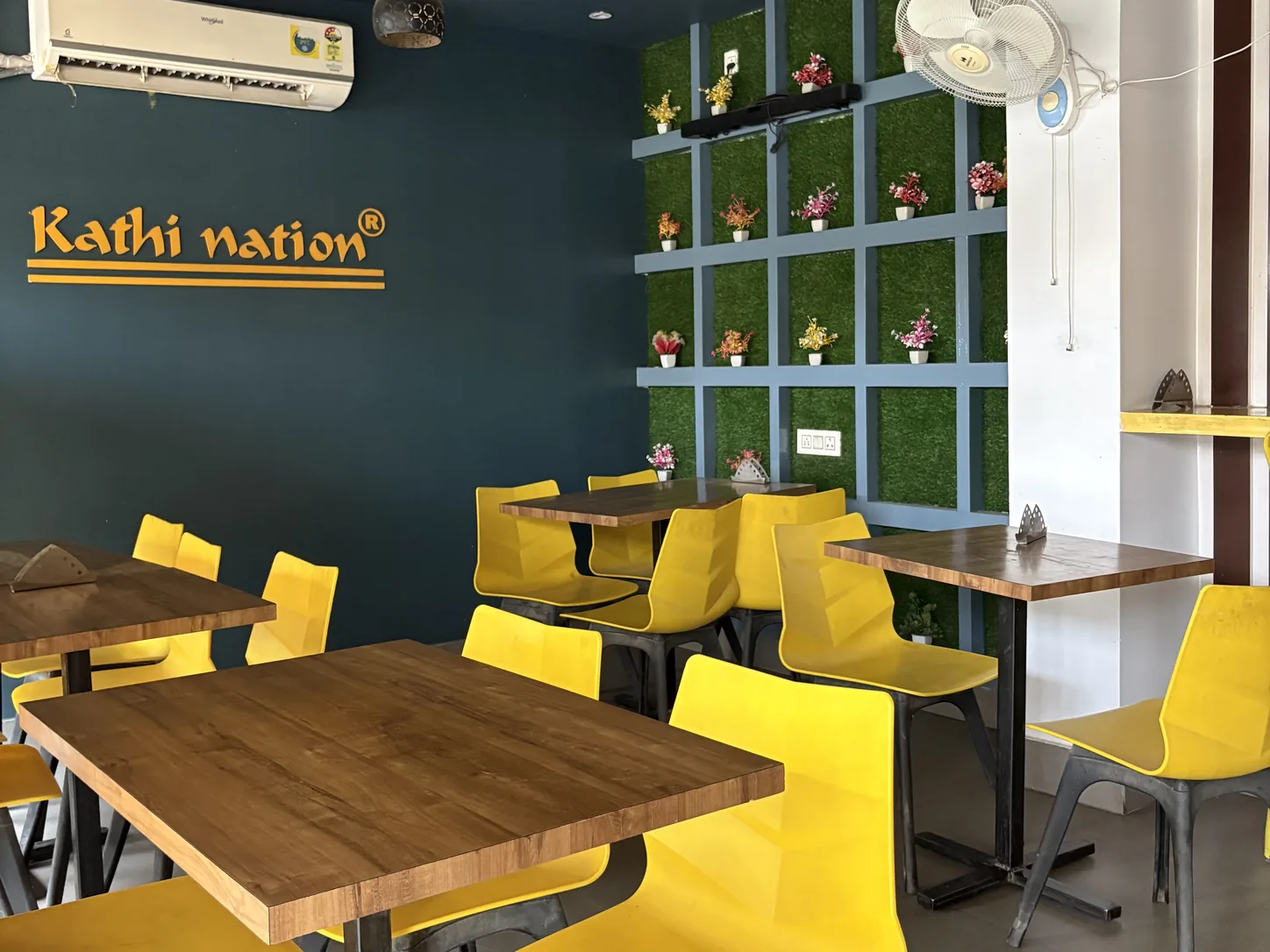 In-house dining area with tables set for guests
